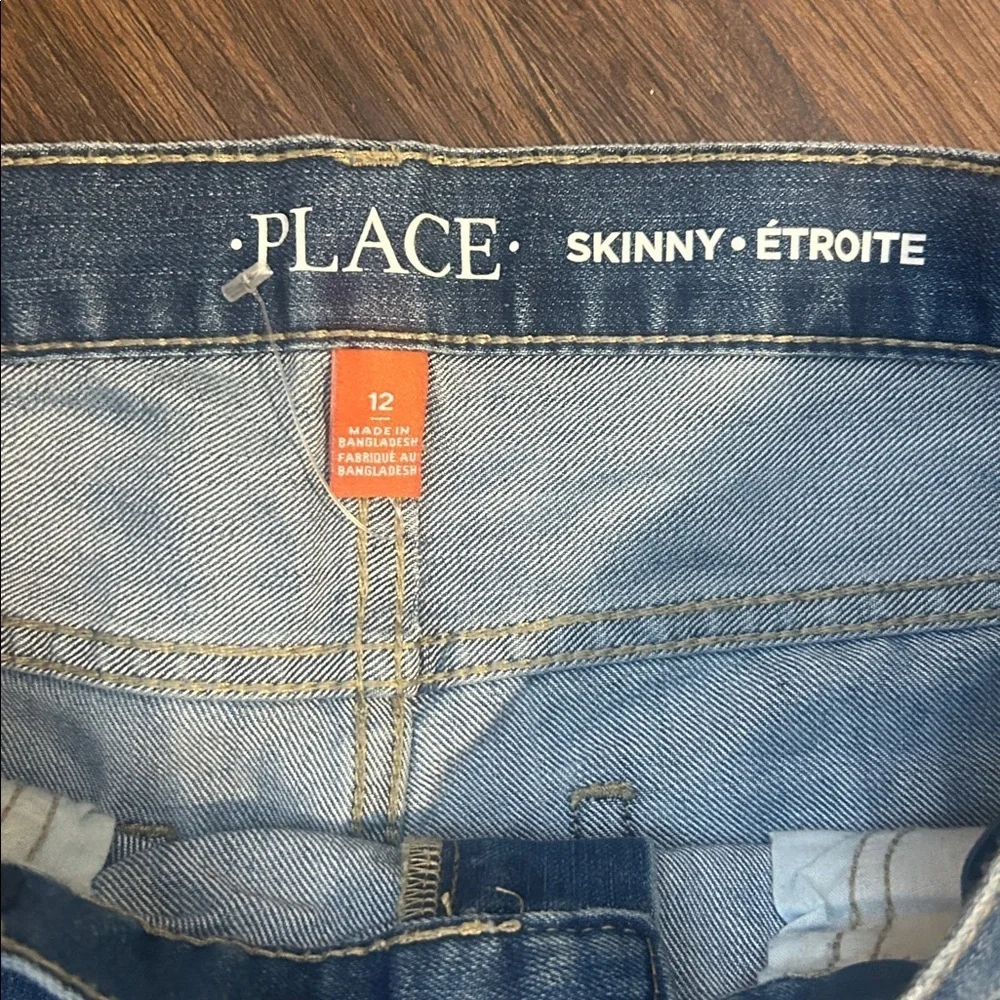 The Children's Place skinny medium wash blue jeans size 12 NWOT